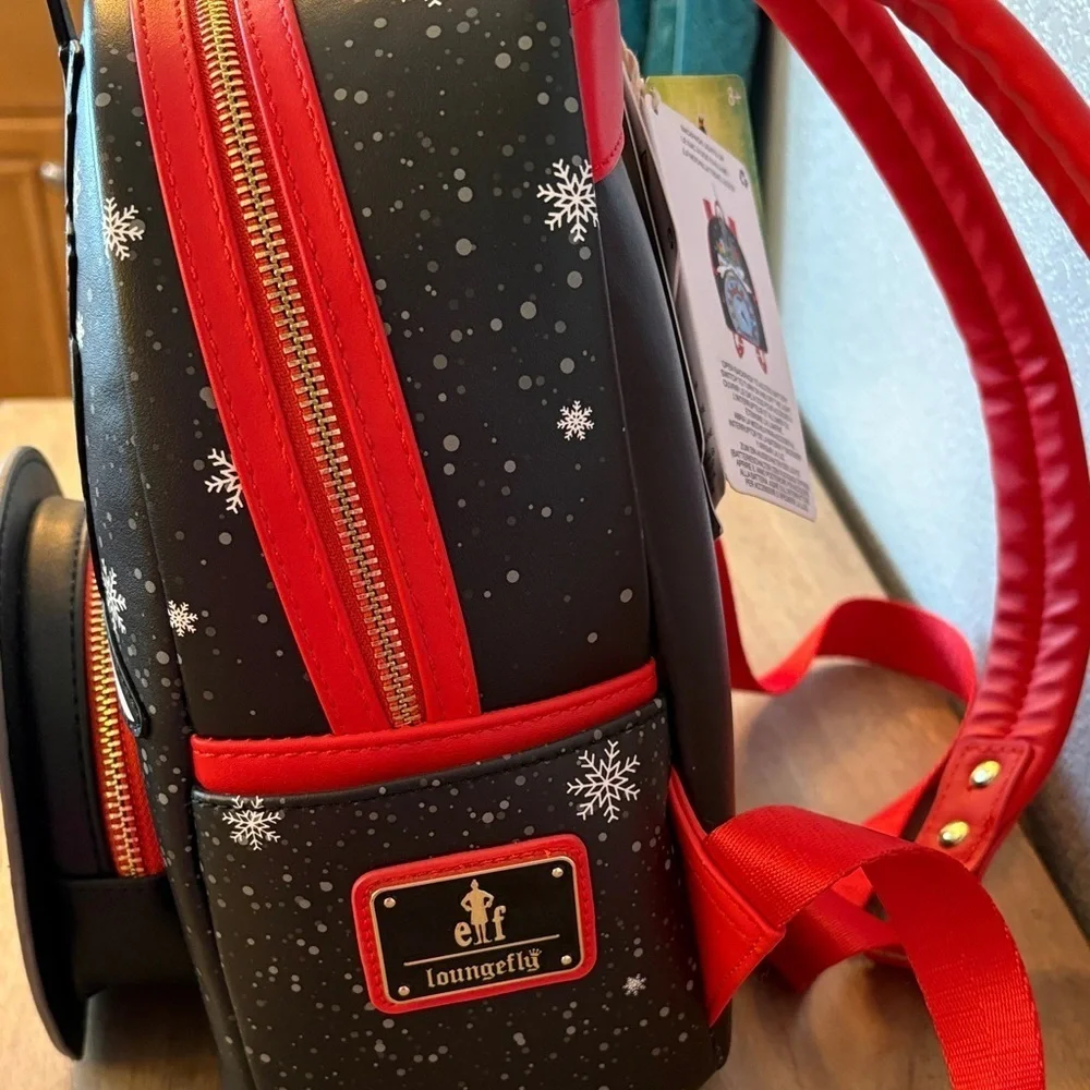 ELF Loungefly lights up!!! Festive Backpack with Clausometer Design